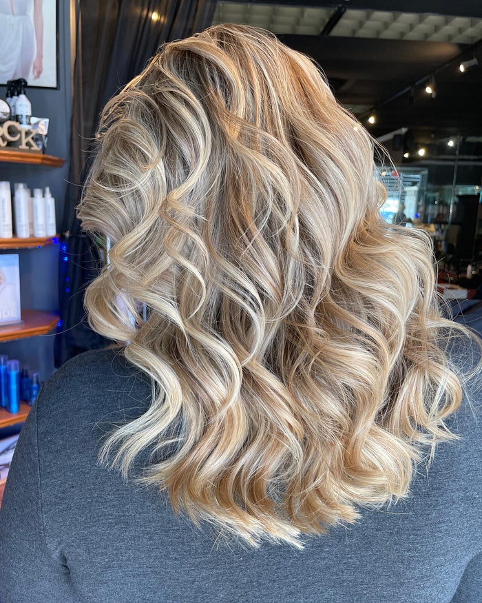 Hair Dynamics salon Fort Lee NJ — bouncy blonde blowout waves