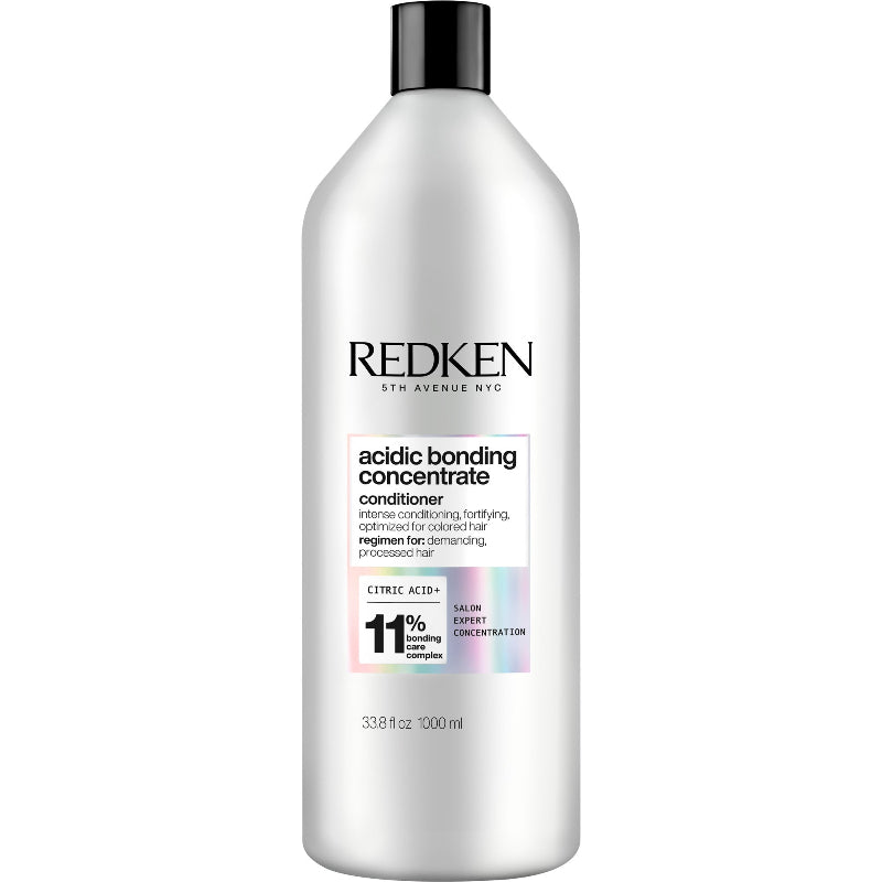 Redken acidic bonding concentrate conditioner bottle on a white background