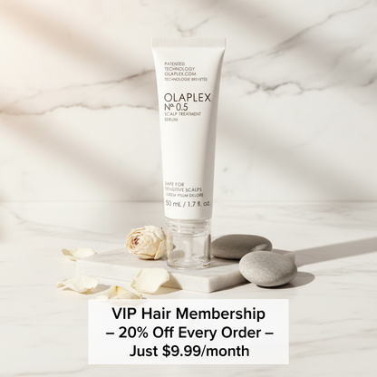 Olaplex haircare product styled on marble - HairDynamics VIP Hair Membership ad