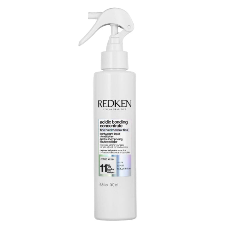 Redken bottle with a white background